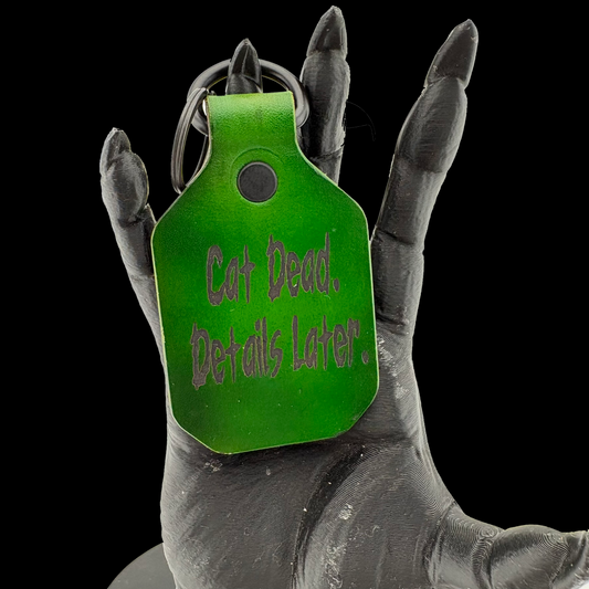 "Cat Dead. Details Later." Keyring